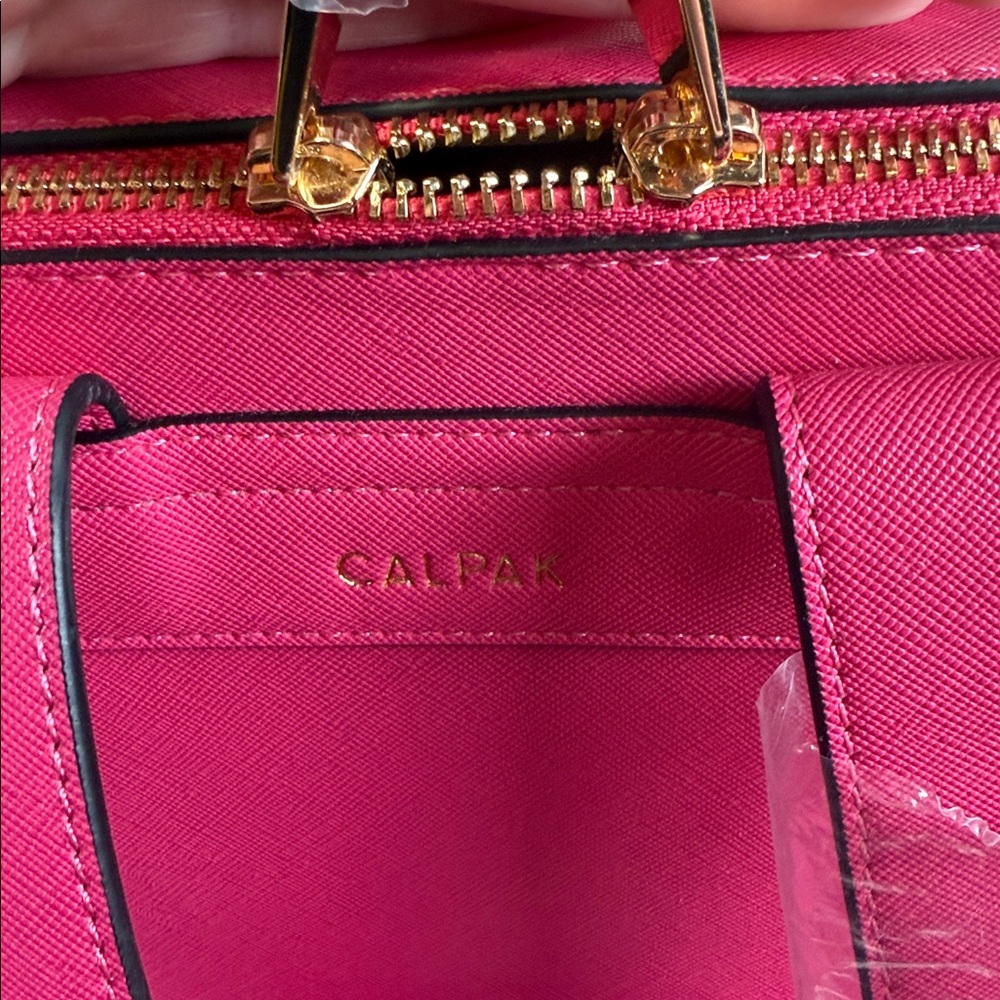 Stylish Pink Women's Bag CALPAK Kaya 15 inch Laptop Backpack in
Dragonfruit B22 - Picture 9 of 11